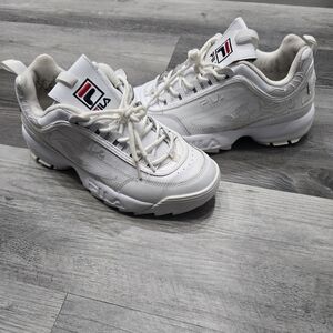 FILA Disruptor II sneakers feature decorative floral embroidery on the side